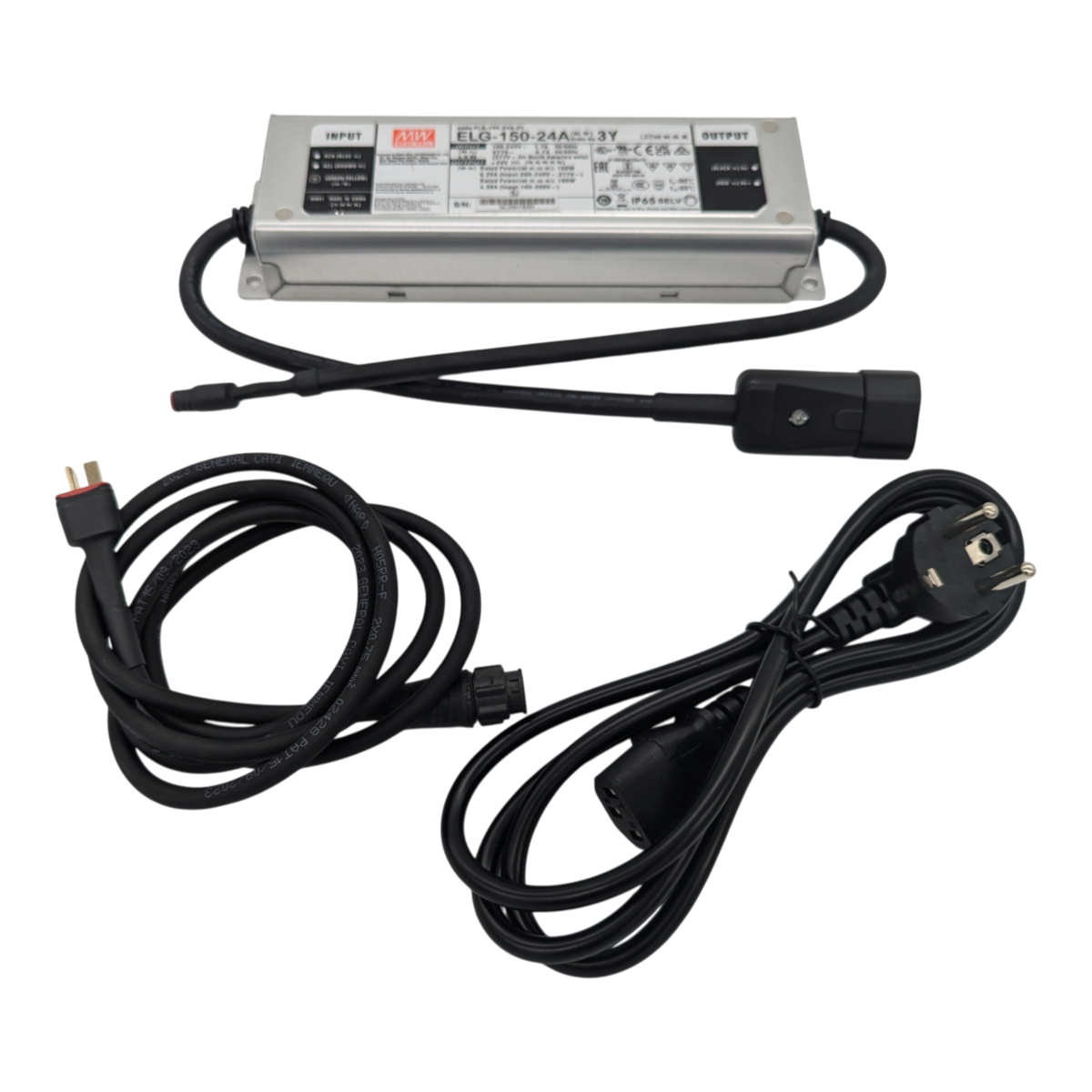 skidvalla.se Snowglide 24V power adapter with metal casing, connection cables, and power cord for ski edge sharpeners