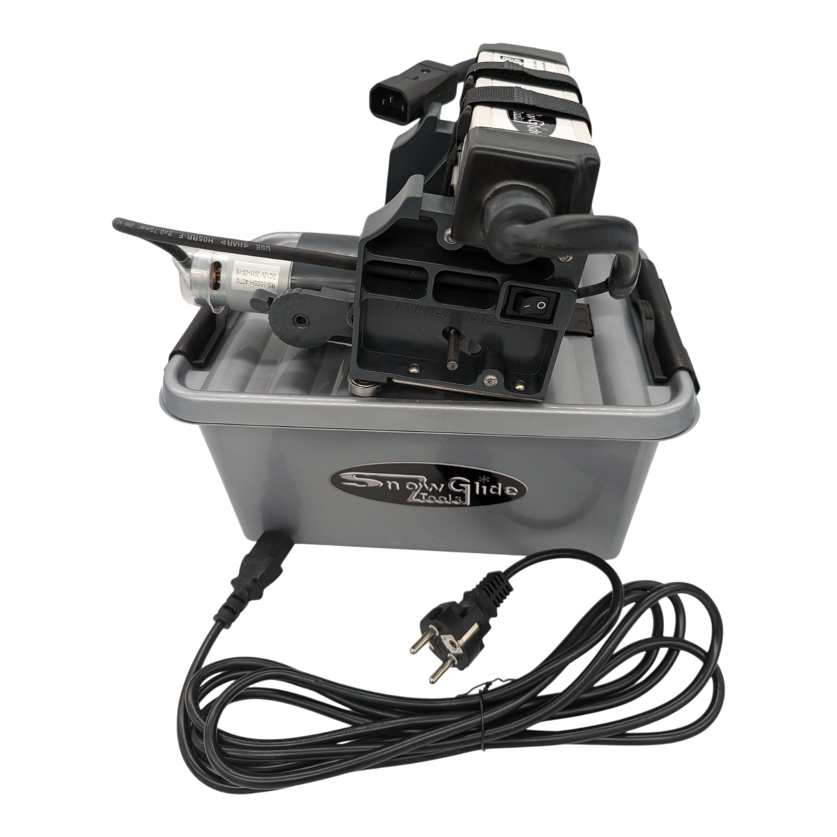 skidvalla.se Snowglide Rhombus electric ski edge sharpener with CBN stone, power adapter, and grey storage case.